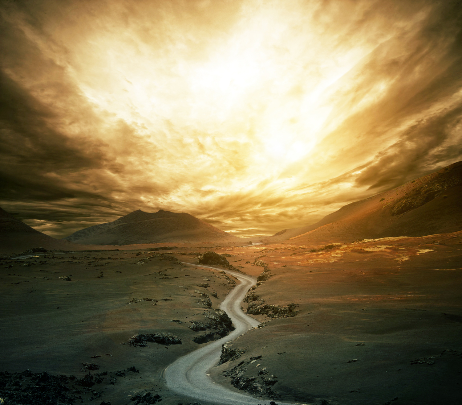 Dramatic sky over road in a valley.